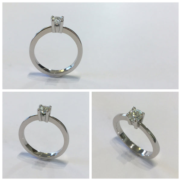Solitaire ring in white gold, straight setting