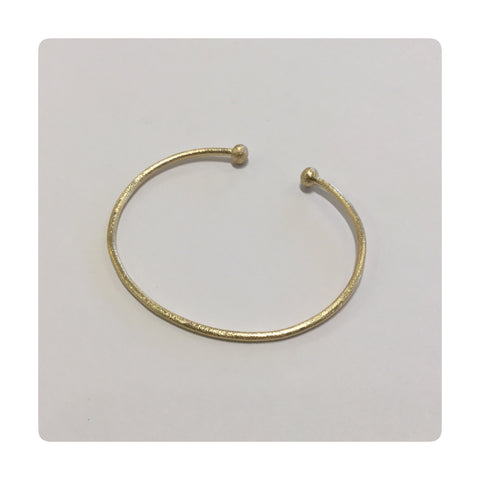 Open bangle with balls