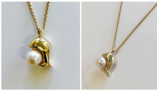 Necklace with dolphin pendant and pearl